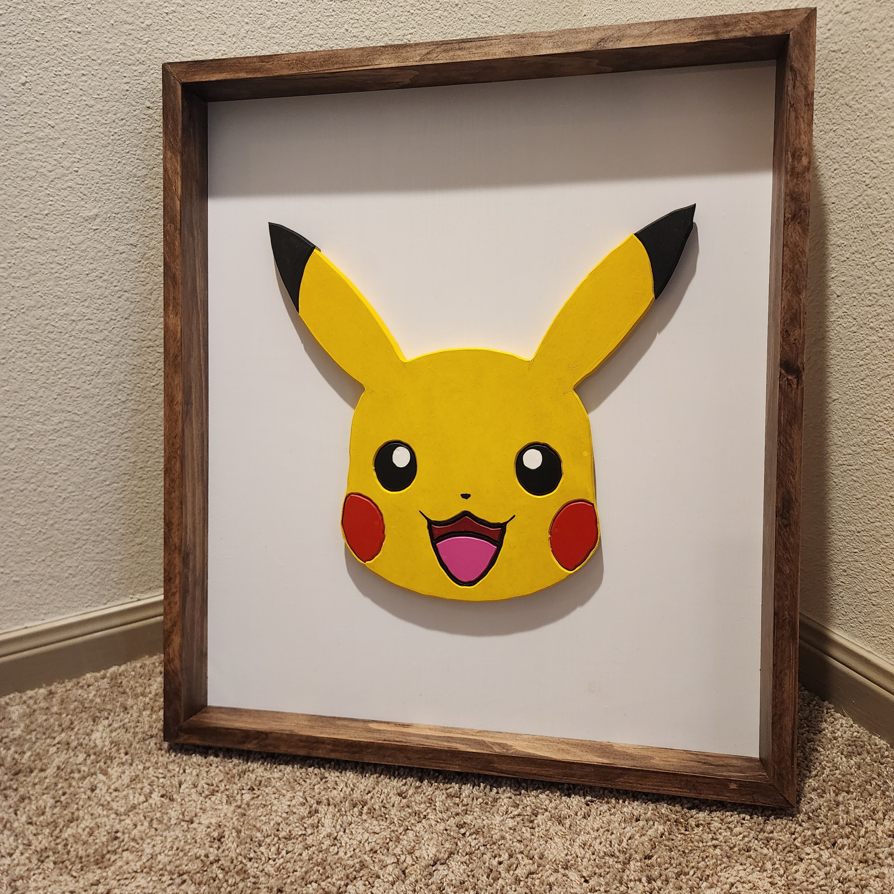 Handmade scroll saw pikachu wall art. Frame is 2