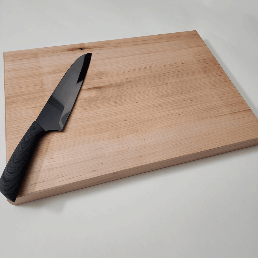 Maple edge grain cutting board with side finger grips. Professional and simple for serious cooks who want quality. Choose size!