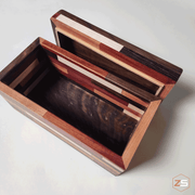 Top view of colorful wooden box with lid.