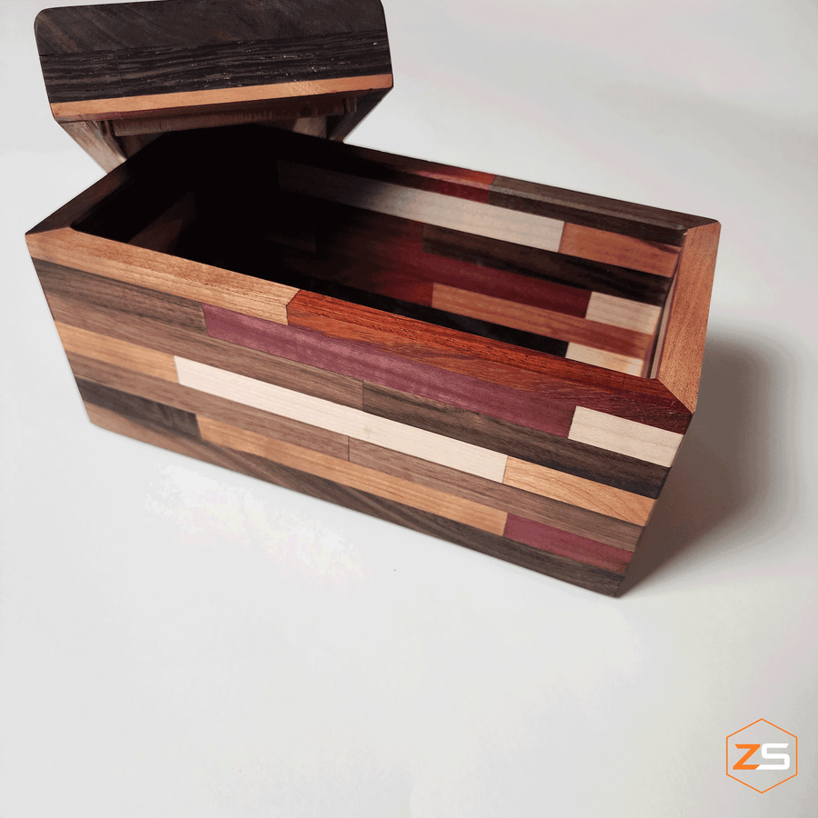 Wooden box made with exotic woods. These different colors come together to create something truly unique.